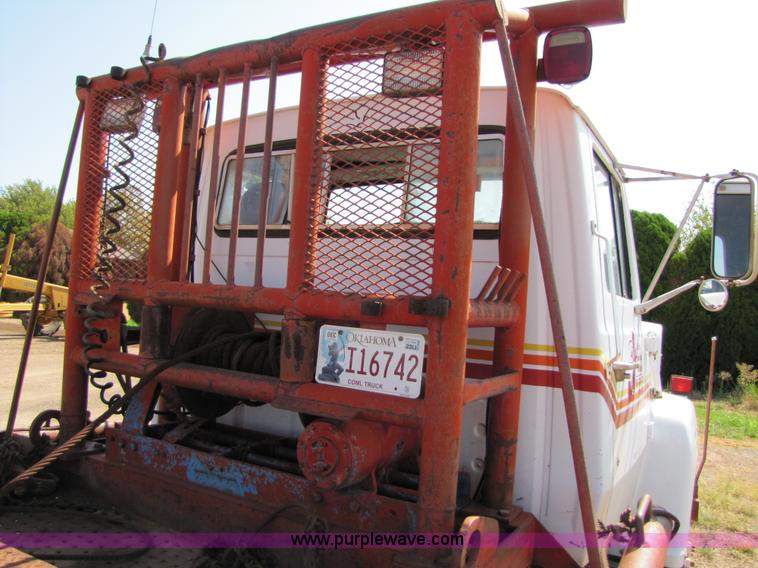 image for item A4672 1984 Ford 8000 winch truck