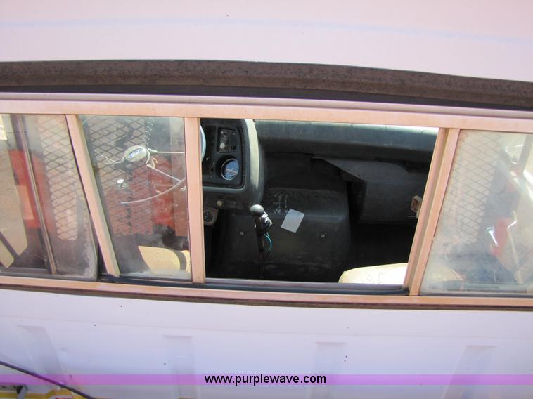 image for item A4672 1984 Ford 8000 winch truck