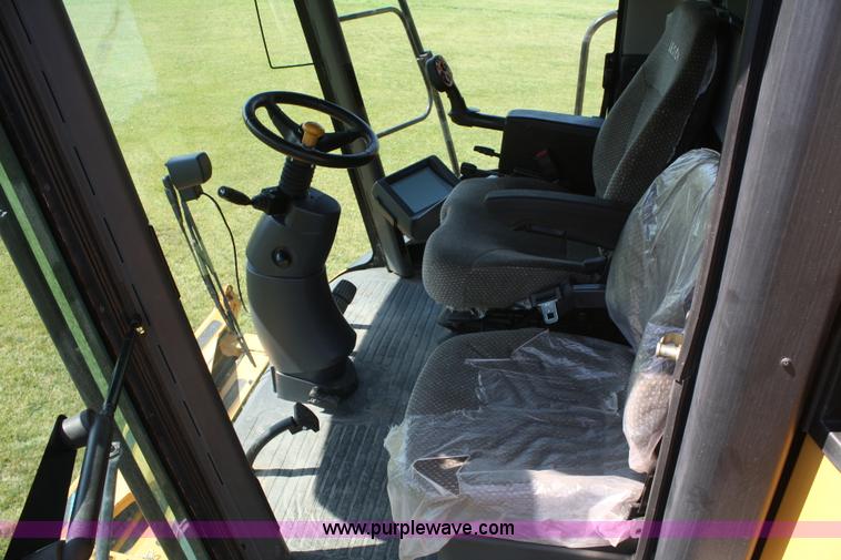 image for item A2167 2006 Lexion 560R RWA combine