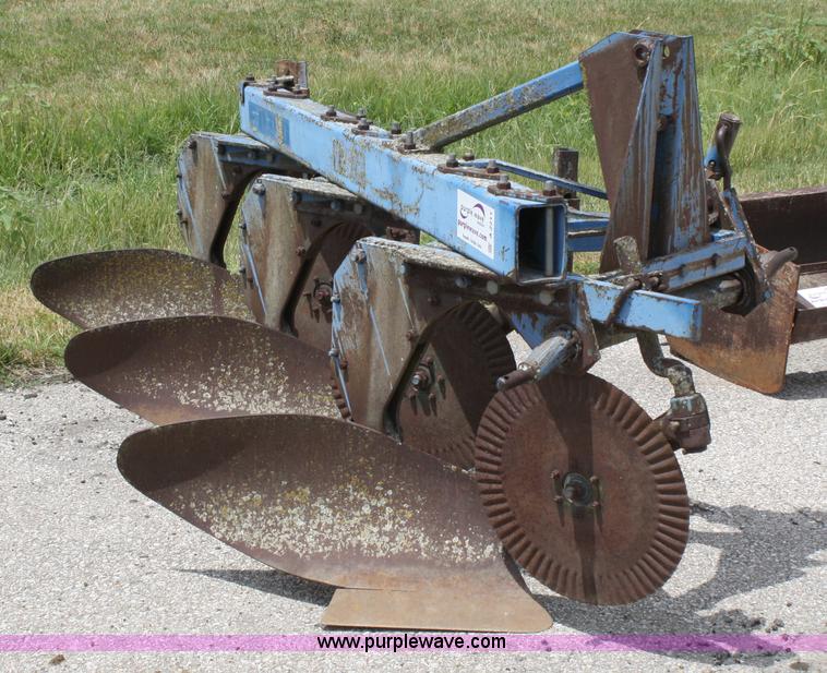 image for item A2211 Ford 142 three bottom plow