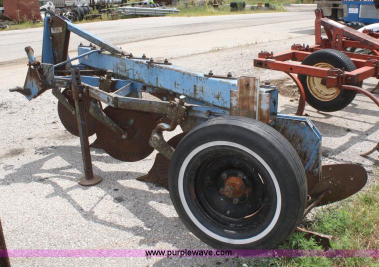 image for item A2211 Ford 142 three bottom plow