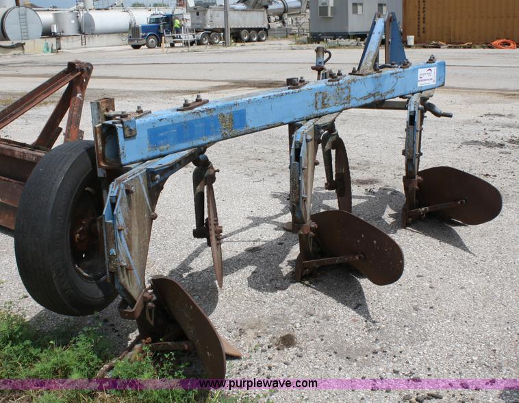 image for item A2211 Ford 142 three bottom plow