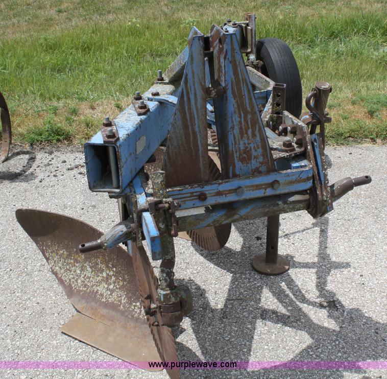 image for item A2211 Ford 142 three bottom plow