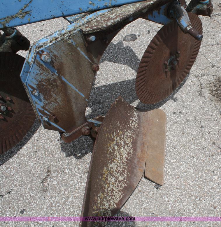 image for item A2211 Ford 142 three bottom plow