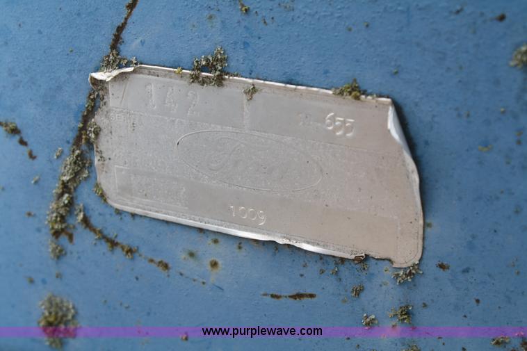 image for item A2211 Ford 142 three bottom plow