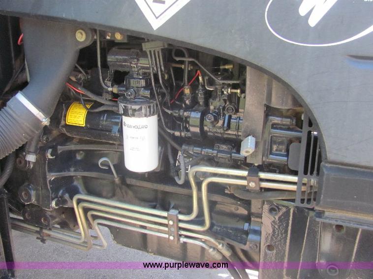 image for item A3659 New Holland TS110 tractor