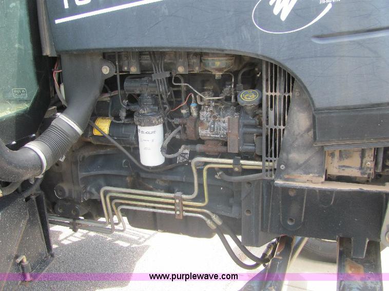 image for item A3662 New Holland TS110 tractor