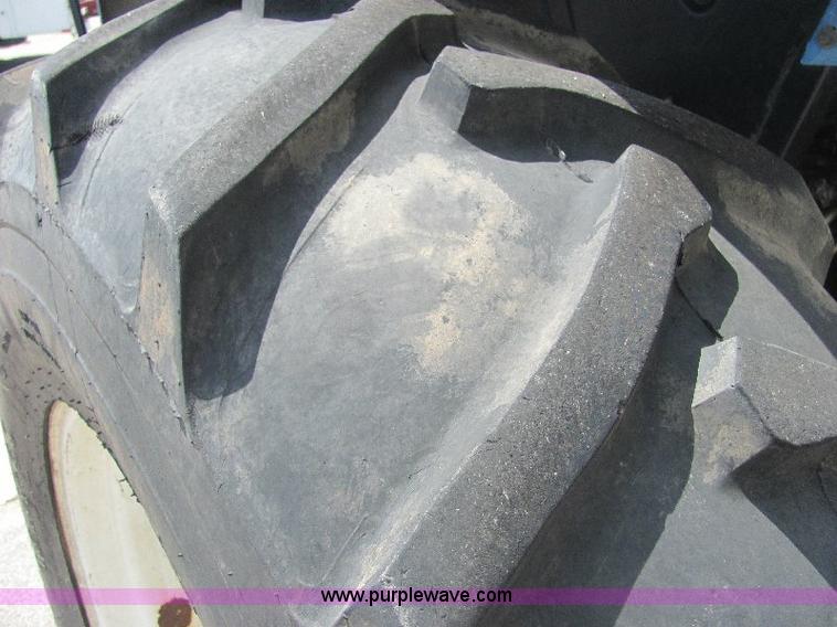 image for item A3662 New Holland TS110 tractor