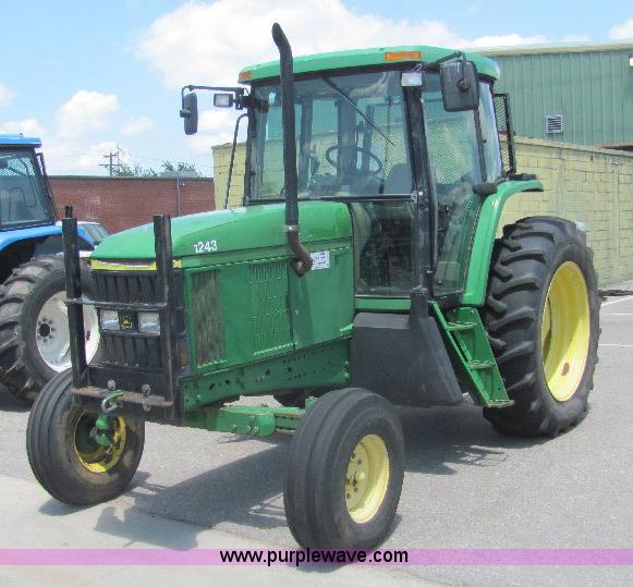 image for item A3663 2002 John Deere 6605 tractor