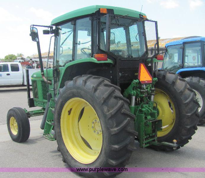 image for item A3663 2002 John Deere 6605 tractor