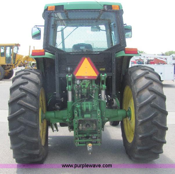 image for item A3663 2002 John Deere 6605 tractor