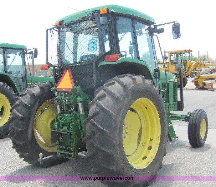 image for item A3663 2002 John Deere 6605 tractor
