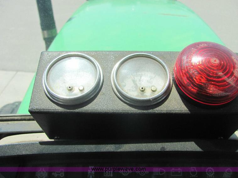 image for item A3663 2002 John Deere 6605 tractor