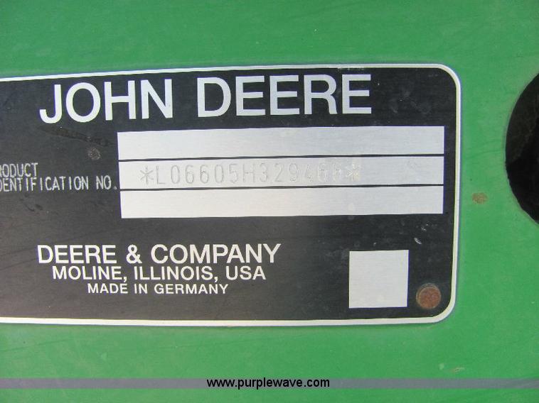 image for item A3663 2002 John Deere 6605 tractor