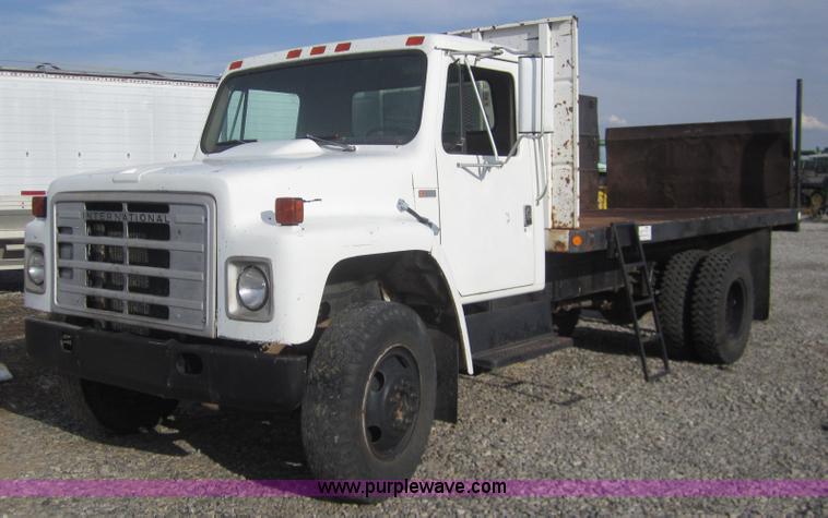 image for item A3867 1982 International 1724 flatbed semi truck