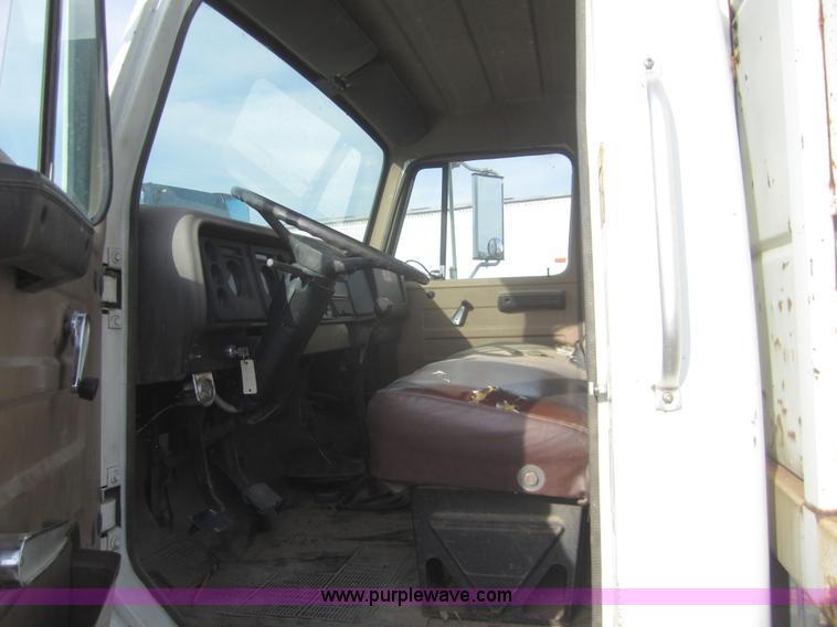 image for item A3867 1982 International 1724 flatbed semi truck