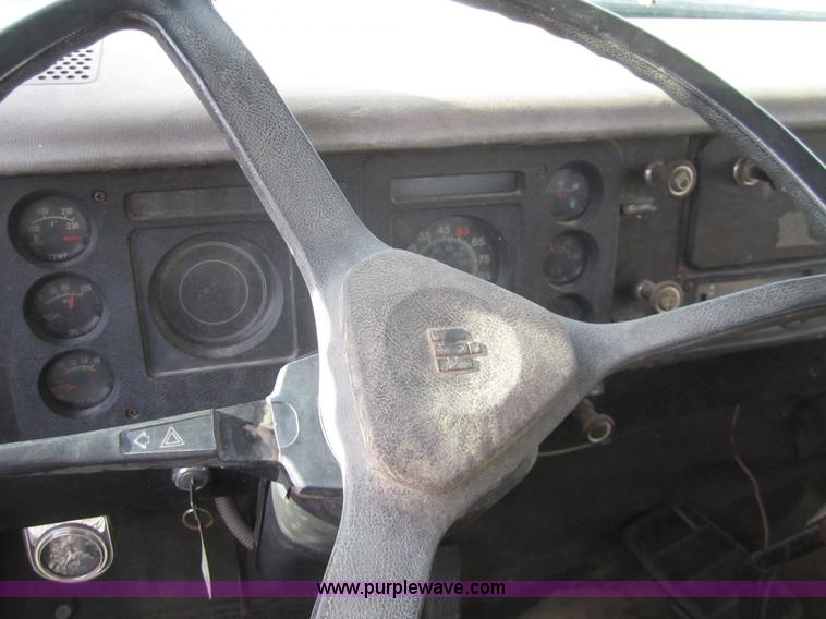 image for item A3867 1982 International 1724 flatbed semi truck