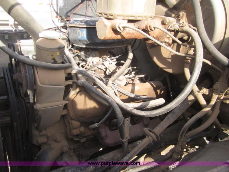 image for item A3867 1982 International 1724 flatbed semi truck