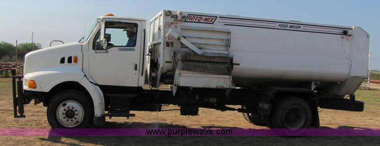 image for item A4660 1997 Ford Louisville feed truck with Roto-mix 600-16 mixer