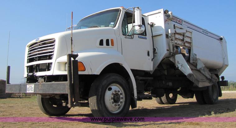 image for item A4660 1997 Ford Louisville feed truck with Roto-mix 600-16 mixer