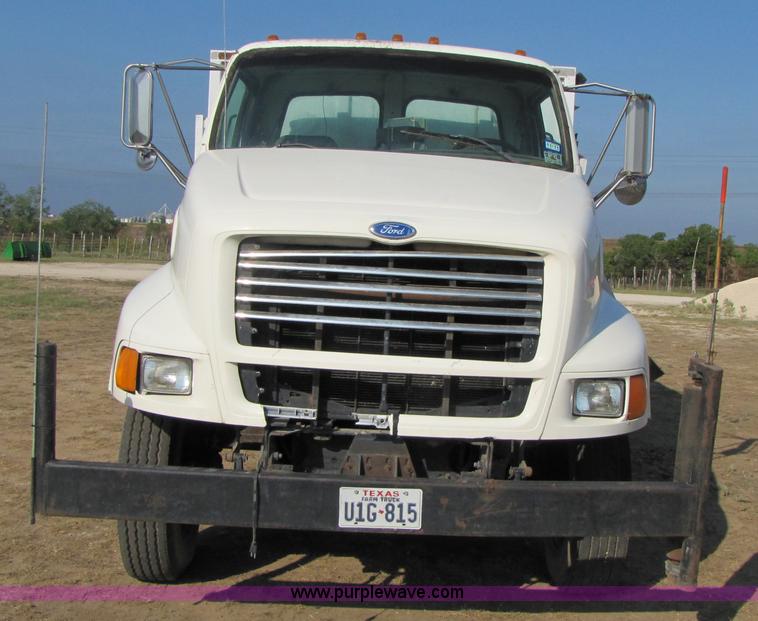 image for item A4660 1997 Ford Louisville feed truck with Roto-mix 600-16 mixer