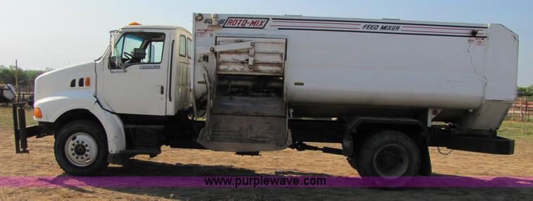 image for item A4660 1997 Ford Louisville feed truck with Roto-mix 600-16 mixer