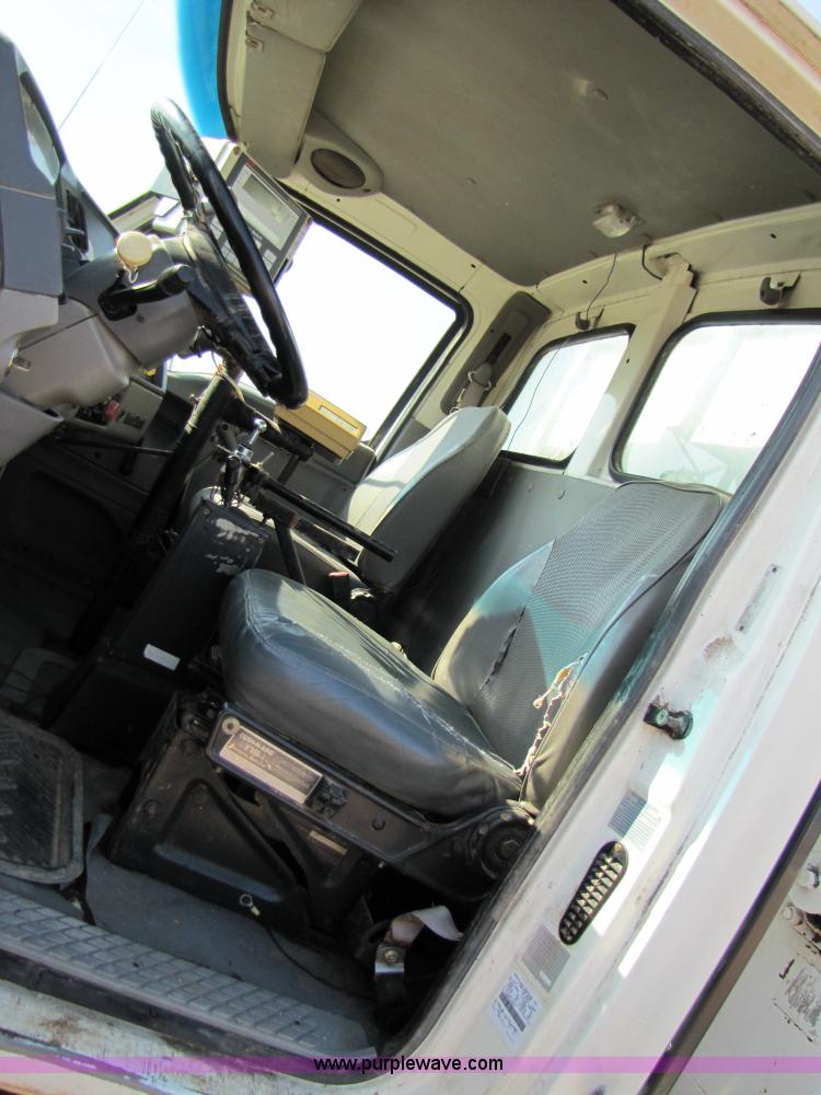 image for item A4660 1997 Ford Louisville feed truck with Roto-mix 600-16 mixer