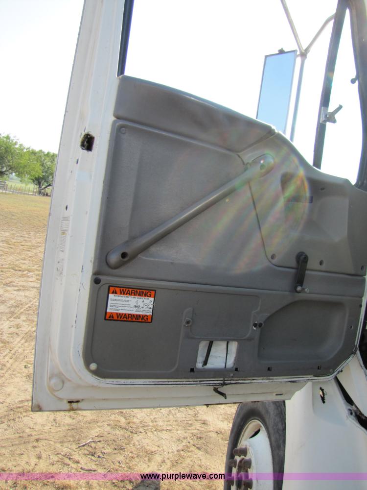 image for item A4660 1997 Ford Louisville feed truck with Roto-mix 600-16 mixer