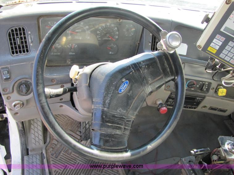 image for item A4660 1997 Ford Louisville feed truck with Roto-mix 600-16 mixer