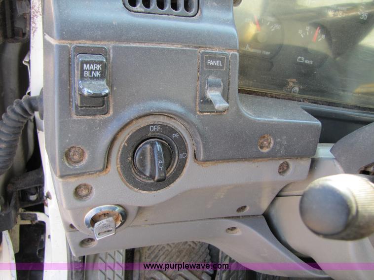 image for item A4660 1997 Ford Louisville feed truck with Roto-mix 600-16 mixer