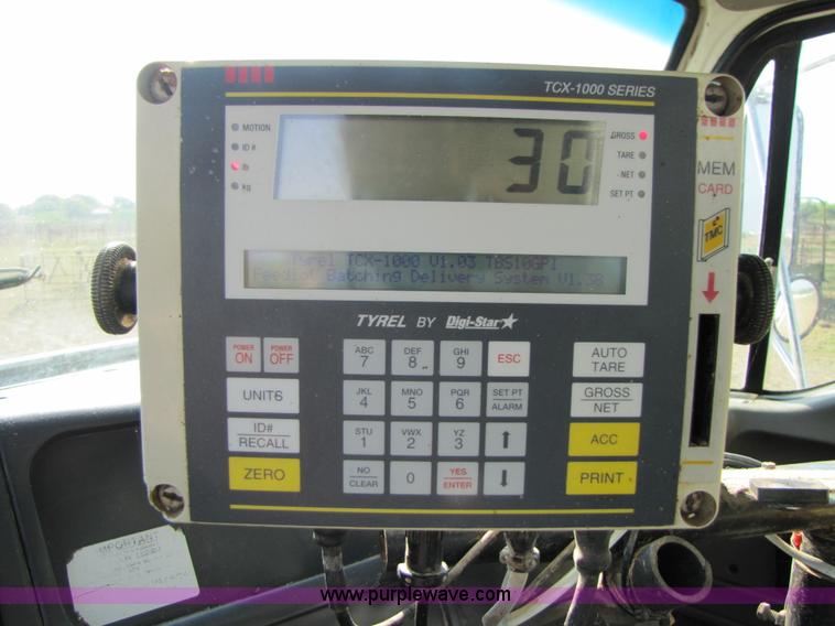 image for item A4660 1997 Ford Louisville feed truck with Roto-mix 600-16 mixer