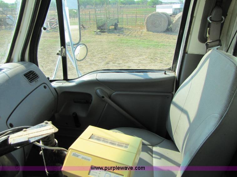 image for item A4660 1997 Ford Louisville feed truck with Roto-mix 600-16 mixer