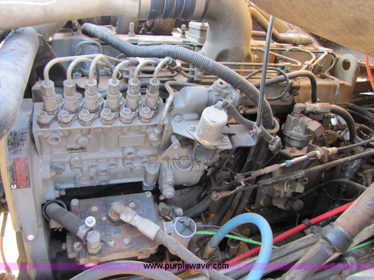 image for item A4660 1997 Ford Louisville feed truck with Roto-mix 600-16 mixer