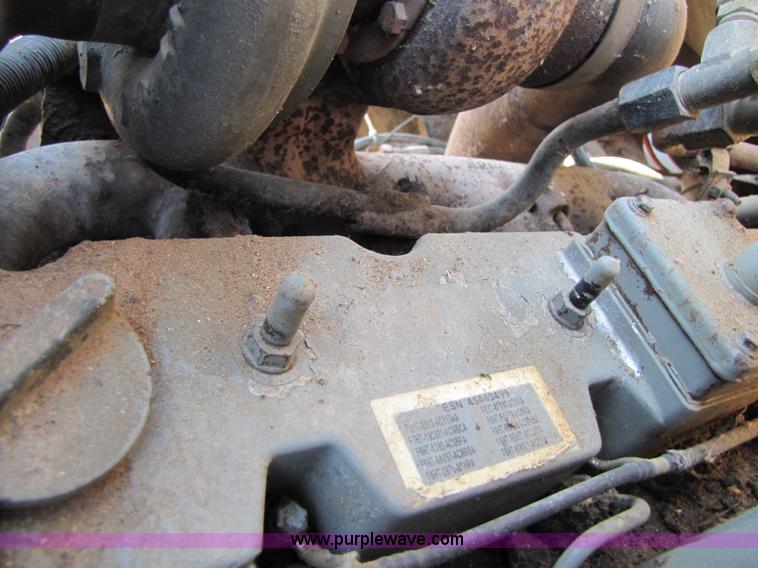 image for item A4660 1997 Ford Louisville feed truck with Roto-mix 600-16 mixer