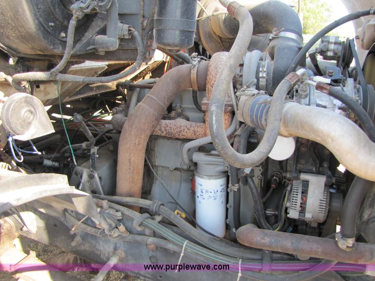 image for item A4660 1997 Ford Louisville feed truck with Roto-mix 600-16 mixer