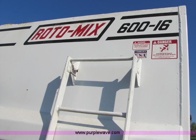 image for item A4660 1997 Ford Louisville feed truck with Roto-mix 600-16 mixer