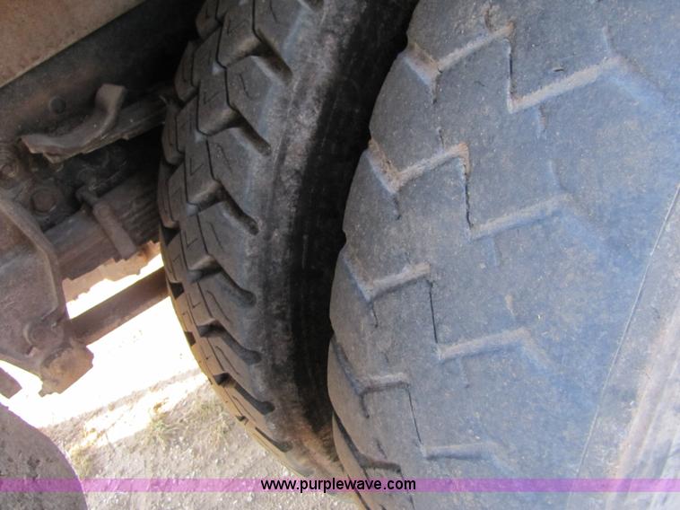 image for item A4660 1997 Ford Louisville feed truck with Roto-mix 600-16 mixer