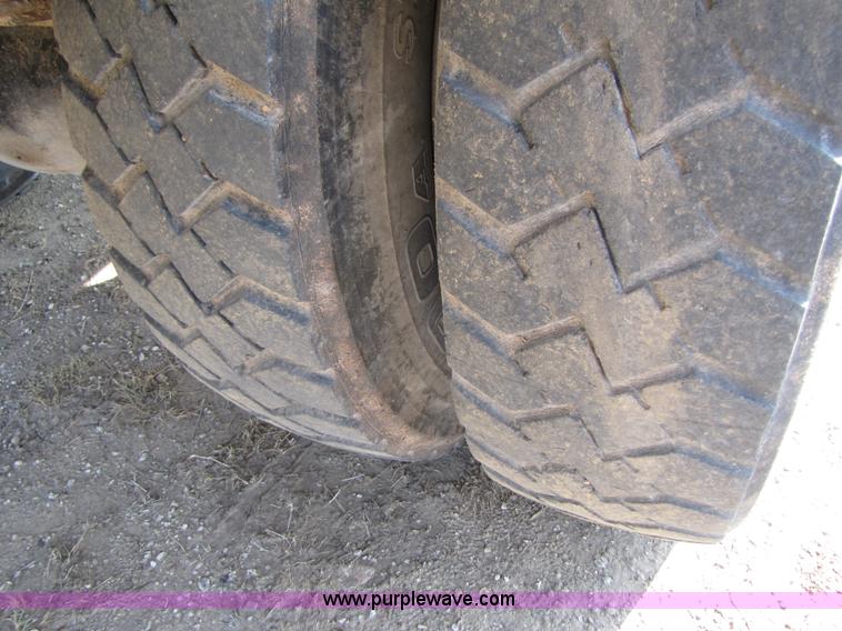 image for item A4660 1997 Ford Louisville feed truck with Roto-mix 600-16 mixer