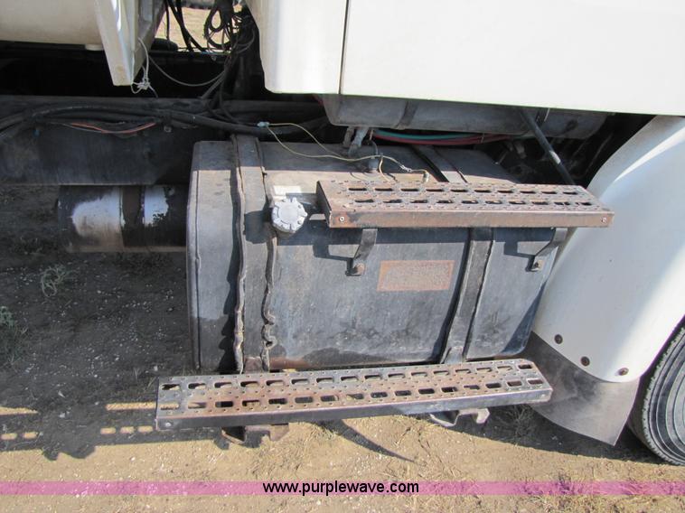 image for item A4660 1997 Ford Louisville feed truck with Roto-mix 600-16 mixer