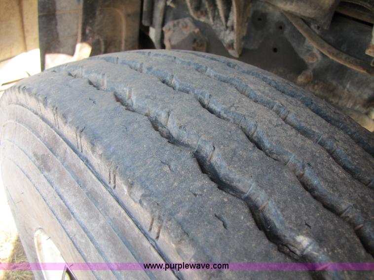 image for item A4660 1997 Ford Louisville feed truck with Roto-mix 600-16 mixer