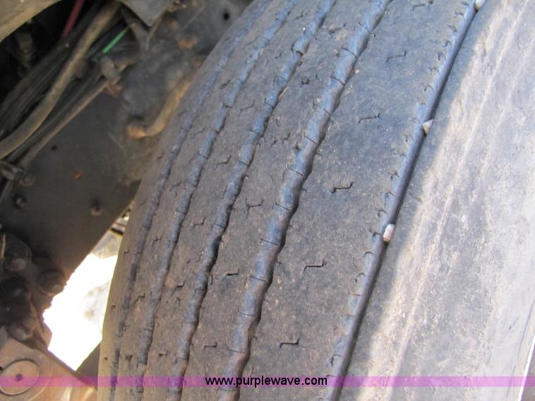 image for item A4660 1997 Ford Louisville feed truck with Roto-mix 600-16 mixer