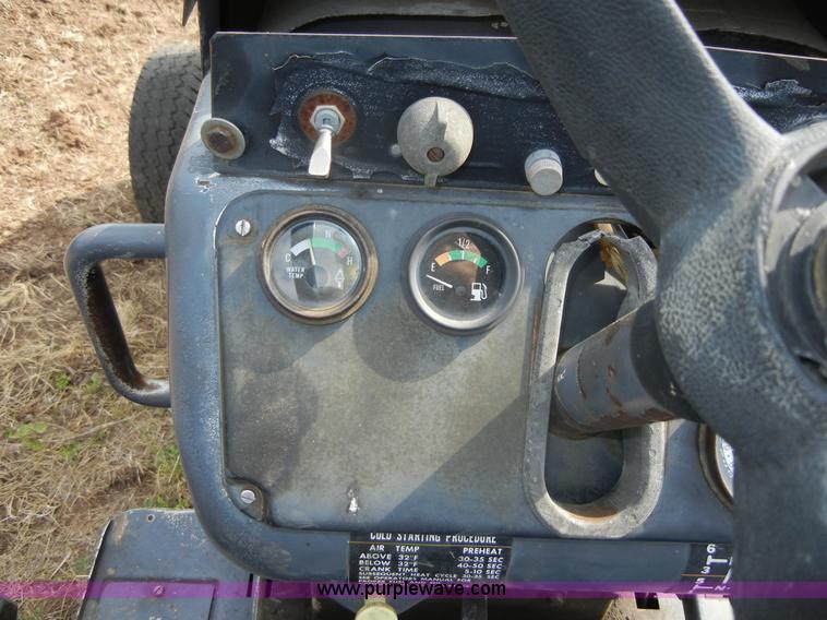 image for item A9973 1977 White 2-70 Field Boss tractor