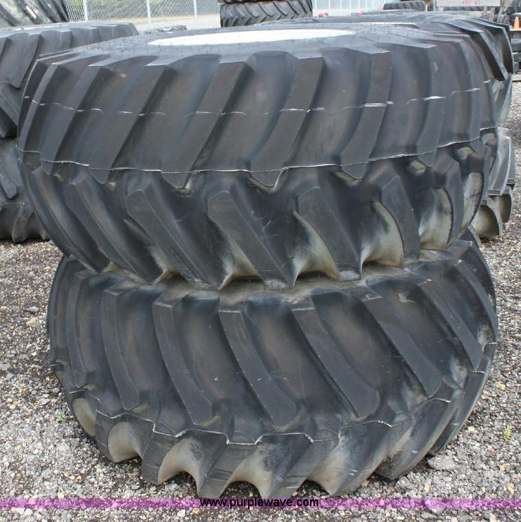 image for item B9833 (2) Firestone 28L-26 wheels and tires