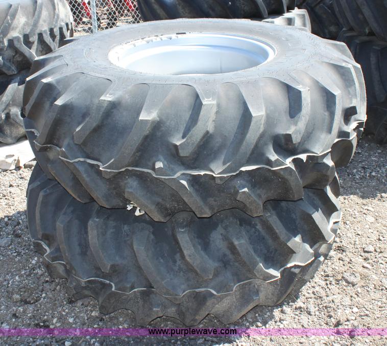 image for item B9834 (2) Goodyear 18.4-26 wheels and tires