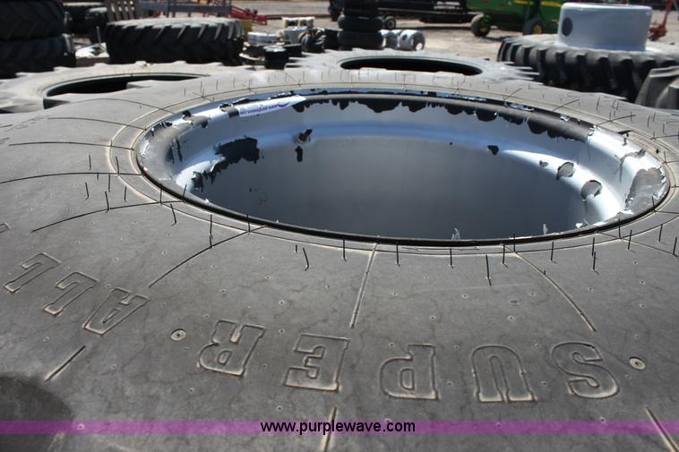 image for item B9837 (2) Firestone 28-26 wheels and tires