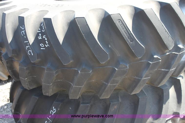 image for item B9839 (2) Firestone 23.1-26 wheels and tires