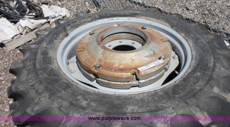 image for item B9857 (2) Goodyear 14.9-28 tractor tires and wheels