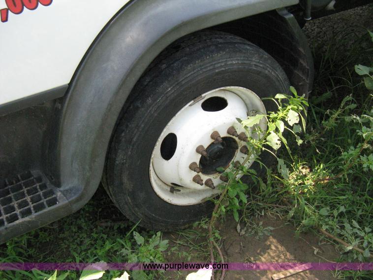 image for item A4297 2006 Ford LCF L45 flatbed utility truck