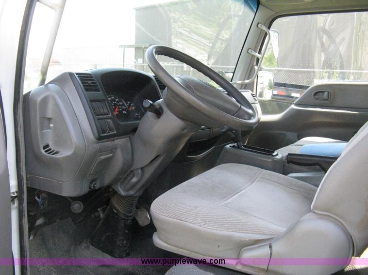 image for item A4297 2006 Ford LCF L45 flatbed utility truck