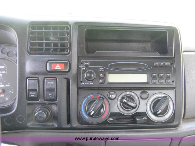 image for item A4297 2006 Ford LCF L45 flatbed utility truck